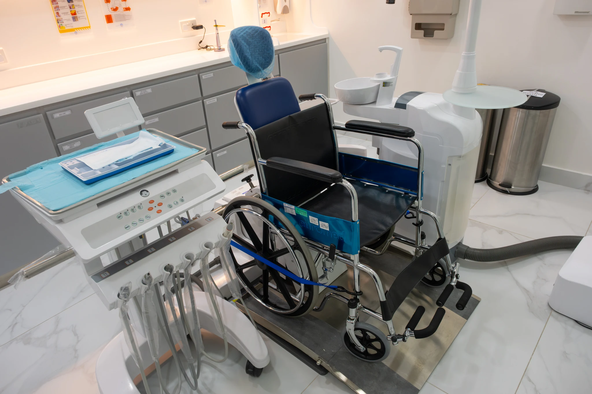 Close view of the accessible dental chair and instrument console at Silwadi Al Raha